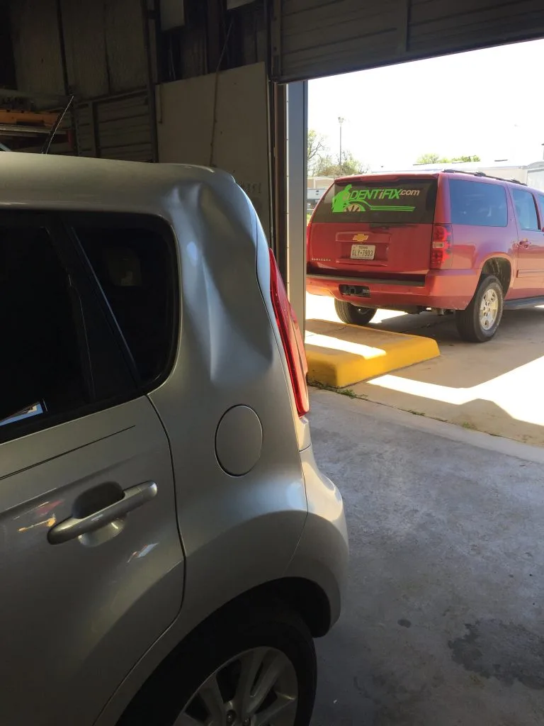 White car before crease repair